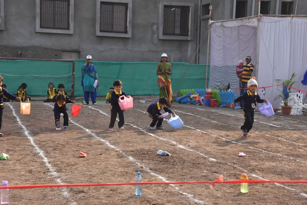 activity base learning cbse pattern campus and ground nursery playing games vijaya school