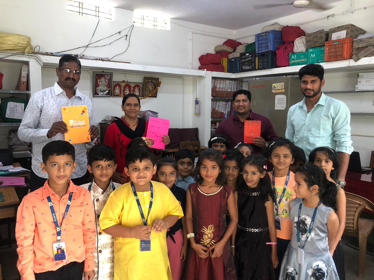 teacher-with-students-creating-cards-vijaya-convent-school