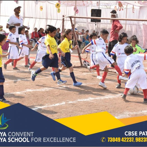 activity school sports day school photos school photos cbse school sports day photos student playing playing at ground student playing foot ball cbse school