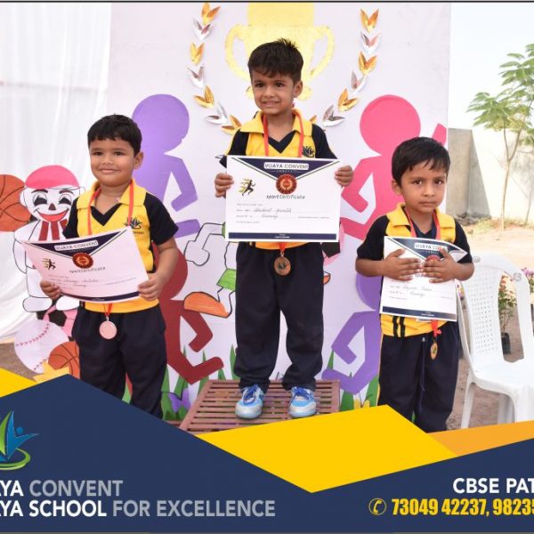 children in sports dress students at sports day prize distribution ceremony at cbse school english medium school